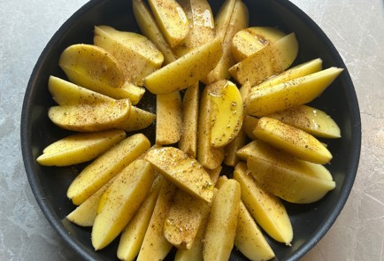 Фото шага рецепта Картофельные дольки в духовке 190010 шаг 7  