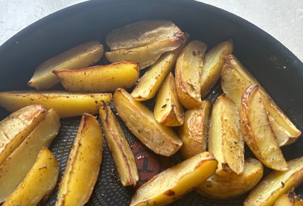 Фото шага рецепта Картофельные дольки в духовке 190010 шаг 9  