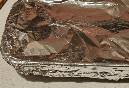 Фото шага рецепта Куриные бедра в духовке в фольге 190853 шаг 9