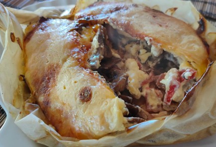 Фото шага рецепта Лодочки с курицей грибами помидором и сыром 176362 шаг 15