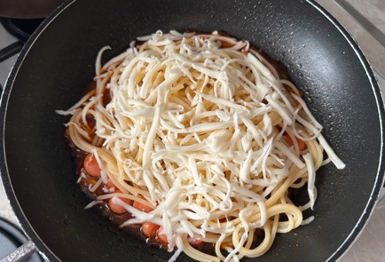 Фото шага рецепта Макароны с сосисками в томатном соусе 189777 шаг 9  