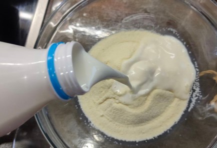 Фото шага рецепта Манник с мандаринами 175335 шаг 3  