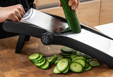 Фото шага рецепта Маринованные огурцы колечками 189118 шаг 2  