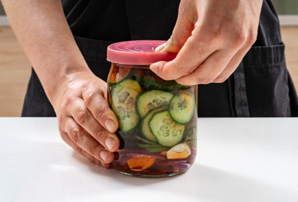 Фото шага рецепта Маринованные огурцы колечками 189118 шаг 9  