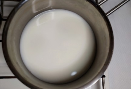 Фото шага рецепта Овсяная каша с томленым яблоком и орешками 188088 шаг 7  