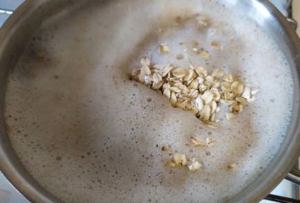 Фото шага рецепта Овсяная каша с томленым яблоком и орешками 188088 шаг 8  