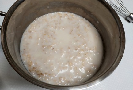 Фото шага рецепта Овсяная каша с томленым яблоком и орешками 188088 шаг 9  