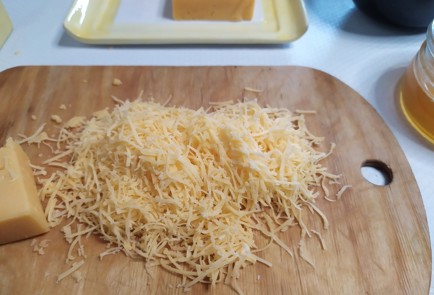 Фото шага рецепта Овсянка с сыром грецкими орехами и медом 187560 шаг 5