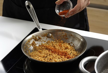 Фото шага рецепта Перловая каша с куриными сердечками 152828 шаг 4  