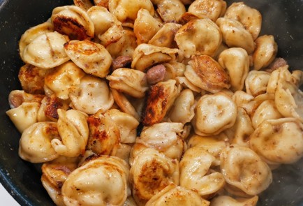 Фото шага рецепта Пикантные пельмени обжаренные на сковороде 152781 шаг 9  