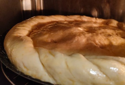 Фото шага рецепта Пирог с капустой зеленым горошком и яйцом 188842 шаг 30  