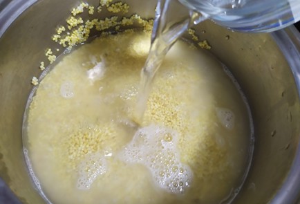 Фото шага рецепта Пшенная каша с томленым нектарином 189723 шаг 4