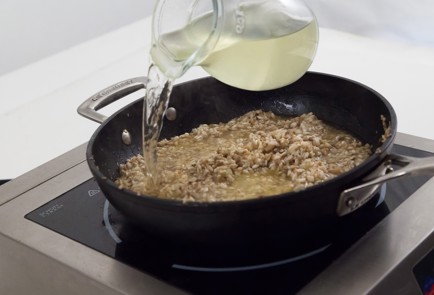 Фото шага рецепта Ризотто с шампиньонами 17656 шаг 2  