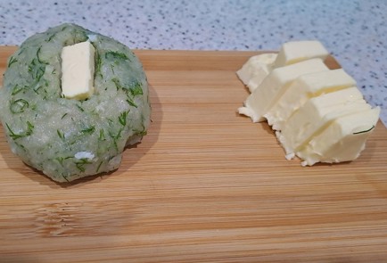 Фото шага рецепта Рыбные котлеты со сливочным маслом в духовке 189496 шаг 10  