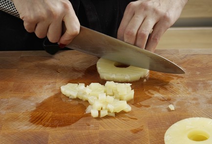 Фото шага рецепта Салат с курицей ананасом и грецкими орехами 152966 шаг 7  