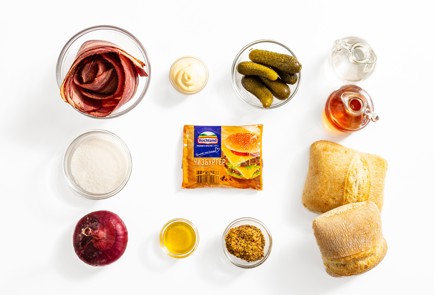 Фото шага рецепта Сэндвич с пастрами сыром и маринованным луком 188034 шаг 1  