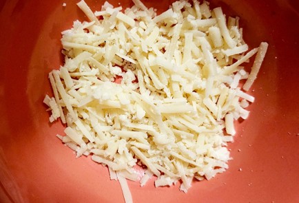 Фото шага рецепта Шампиньоны в духовке с тунцом 190653 шаг 4