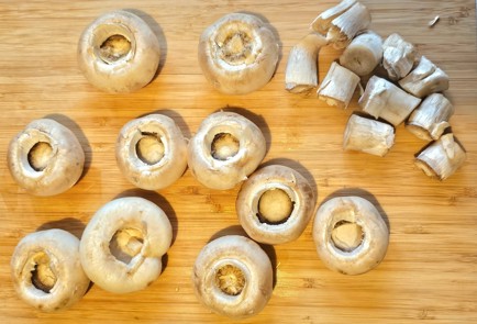 Фото шага рецепта Шампиньоны запеченные под шубой 188428 шаг 2  