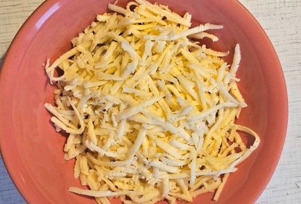 Фото шага рецепта Шампиньоны запеченные под шубой 188428 шаг 4  