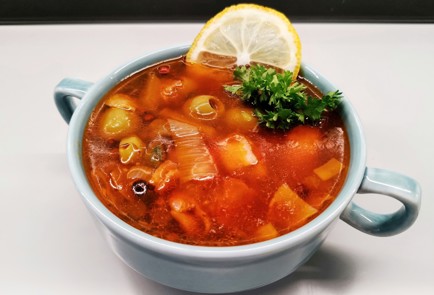 Фото шага рецепта Суп  солянка с курицей 175543 шаг 22  