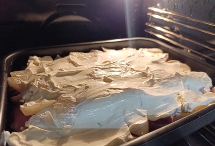 Фото шага рецепта Свиная вырезка пофранцузски с ананасами 190869 шаг 12  