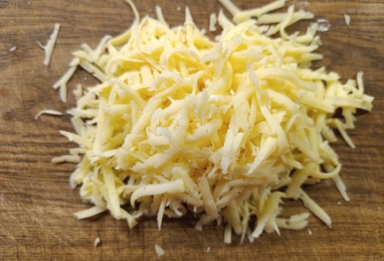 Фото шага рецепта Свиная вырезка пофранцузски с ананасами 190869 шаг 13  