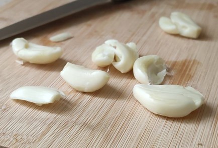 Фото шага рецепта Свинина сочная с чесноком в пергаменте 153259 шаг 6  