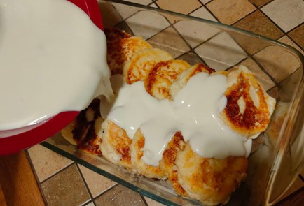 Фото шага рецепта Сырники в сливочнойогуртовой заливке в духовке 175939 шаг 18  