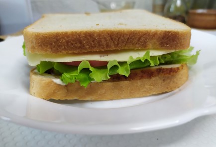 Фото шага рецепта Тосты с курицей 190749 шаг 9