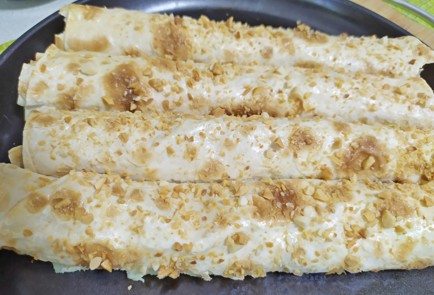 Фото шага рецепта Рулетики из лаваша с творогом и орешками 189730 шаг 11  