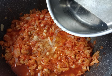 Фото шага рецепта Тушеная капуста с грибами 191431 шаг 9  