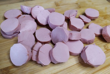 Фото шага рецепта Тушеная капуста с сардельками 188855 шаг 9  