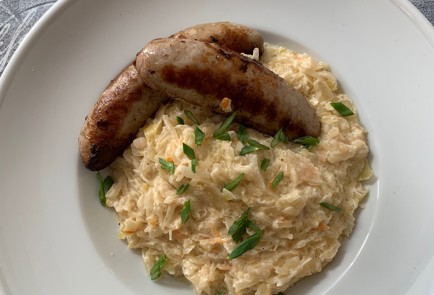 Фото шага рецепта Тушеная квашеная капуста с сосисками пофински 151010 шаг 9  