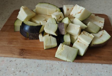 Фото шага рецепта Тушеные баклажаны с помидорами и свежим базиликом 189914 шаг 8  