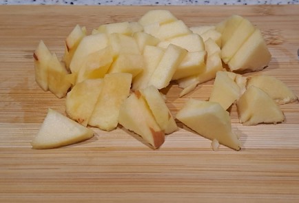 Фото шага рецепта Тыква с рисом изюмом курагой и яблоком запеченная в духовке 187748 шаг 6