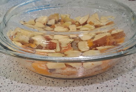 Фото шага рецепта Тыква с рисом изюмом курагой и яблоком запеченная в духовке 187748 шаг 9