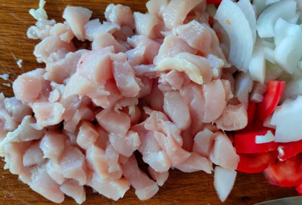 Фото шага рецепта Тыква запеченная половинками с курицей и овощами 174549 шаг 9  