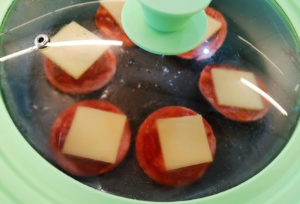 Фото шага рецепта Закуска из колбасы 189888 шаг 9  