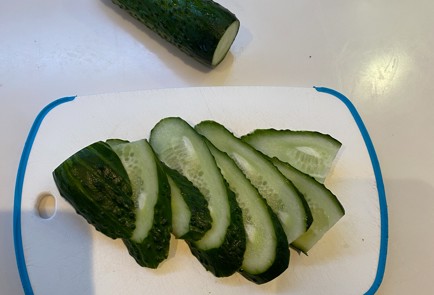 Фото шага рецепта Закуска из огурцов с брынзой 151137 шаг 2