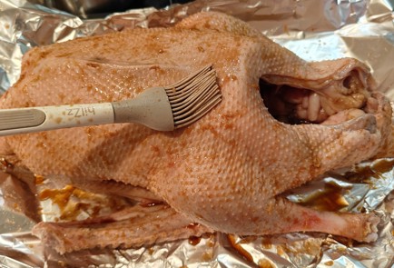 Фото шага рецепта Запеченный гусь с апельсинами и яблоками 191212 шаг 10