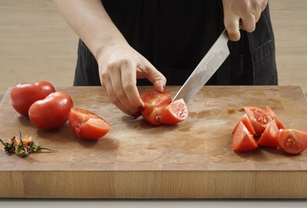 Фото шага рецепта Жаренные с чесноком и маслинами кальмары 153151 шаг 4  