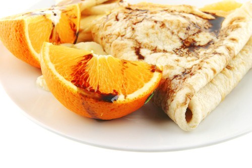 Фото рецепт Апельсиновые блины из овсянки с курагой